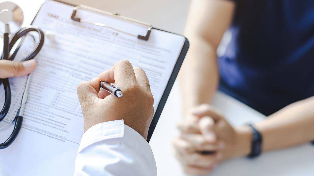 Doctor with clipboard