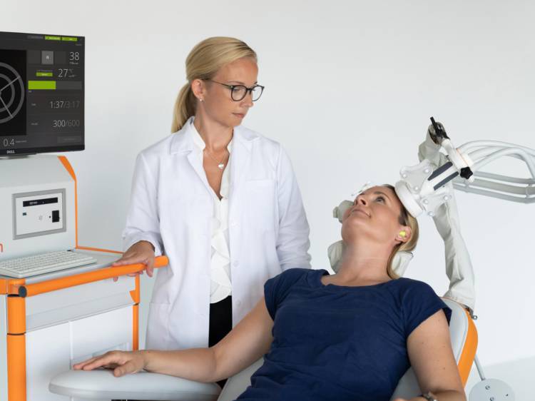 Doctor with patient using n TMS